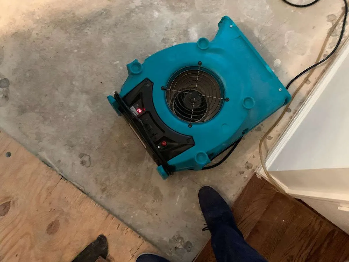 Air mover drying subfloor during Leak Detection & Repair in Alum Rock